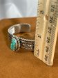 Stamped Turquoise Cuff by Johnathan Nez Fashion