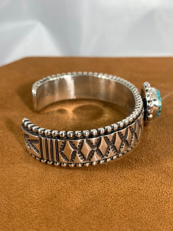 Stamped Turquoise Cuff by Johnathan Nez Fashion