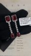 #LVNA2024 | LVNA Signatures Emerald Halo Red Ruby Gemstones Dangling Diamond Earrings 18kt Online now