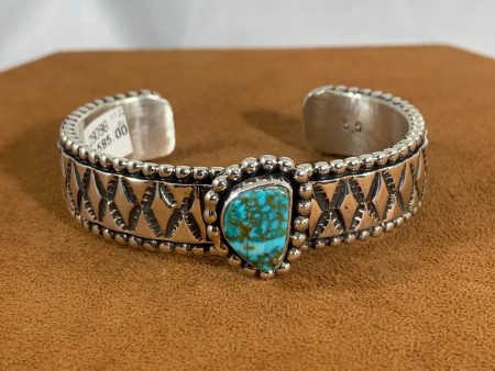 Stamped Turquoise Cuff by Johnathan Nez Fashion